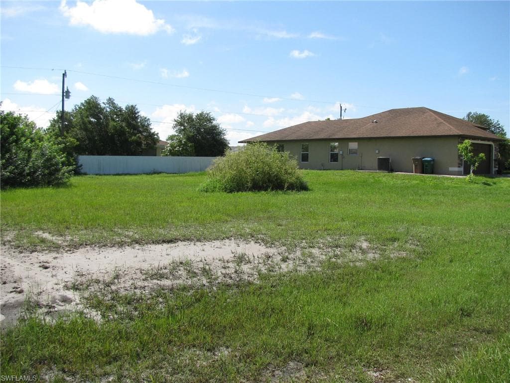 703 NE Juanita CT CAPE CORAL, FL 33909