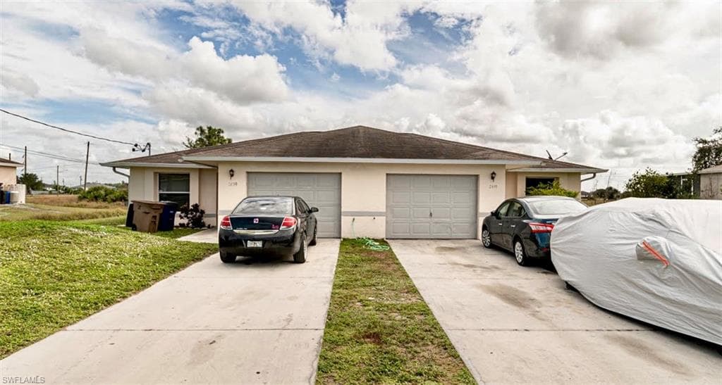 2609 Gilbert AVE S 2611 LEHIGH ACRES, FL 33973