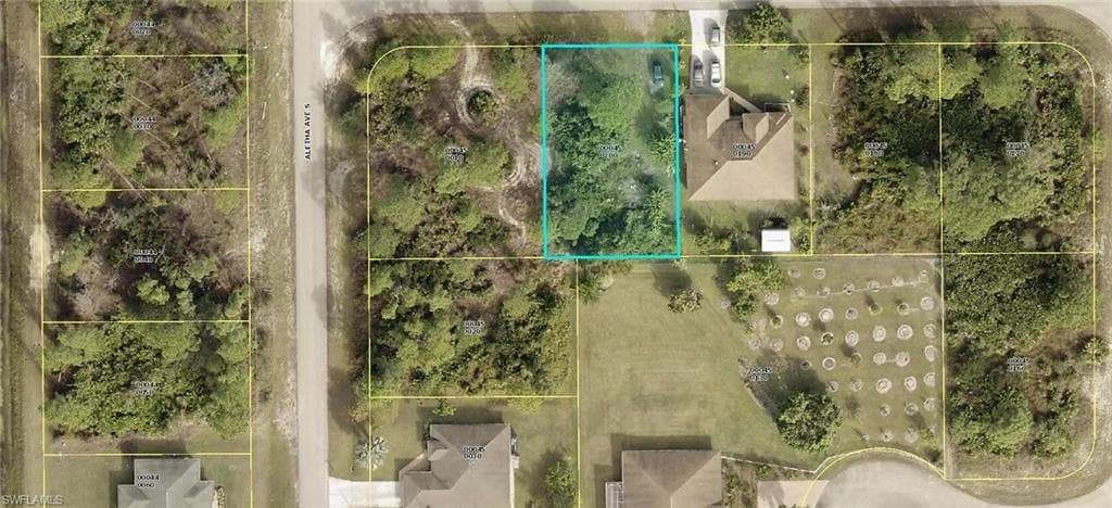 506 Trinity ST E LEHIGH ACRES, FL 33974
