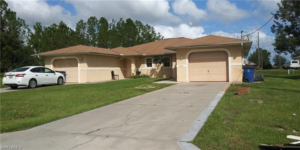 4442/4444 24th ST SW LEHIGH ACRES, FL 33973