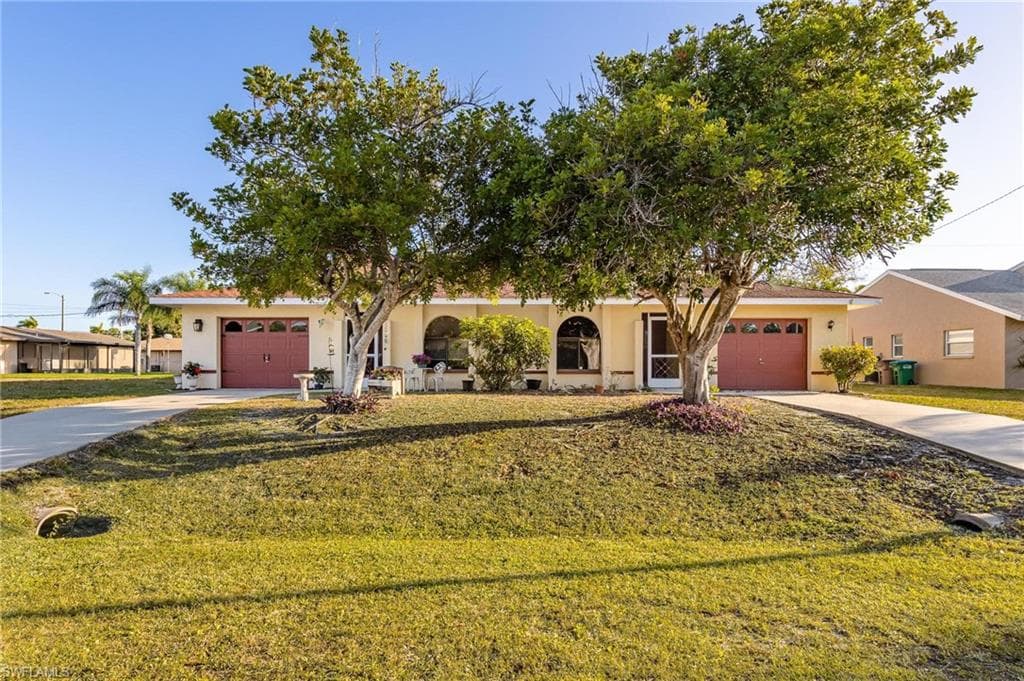718/720 SE 46th TER CAPE CORAL, FL 33904