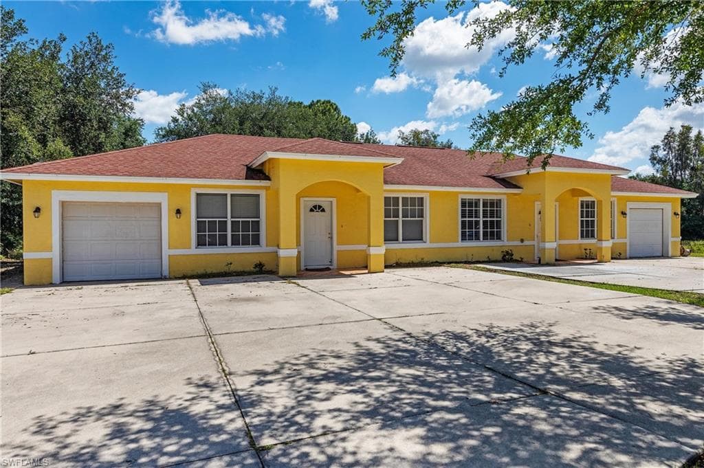 717/719 Meadow RD LEHIGH ACRES, FL 33973
