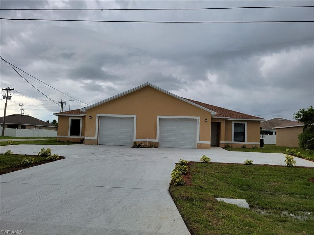 209/211 SW 16th TER CAPE CORAL, FL 33991