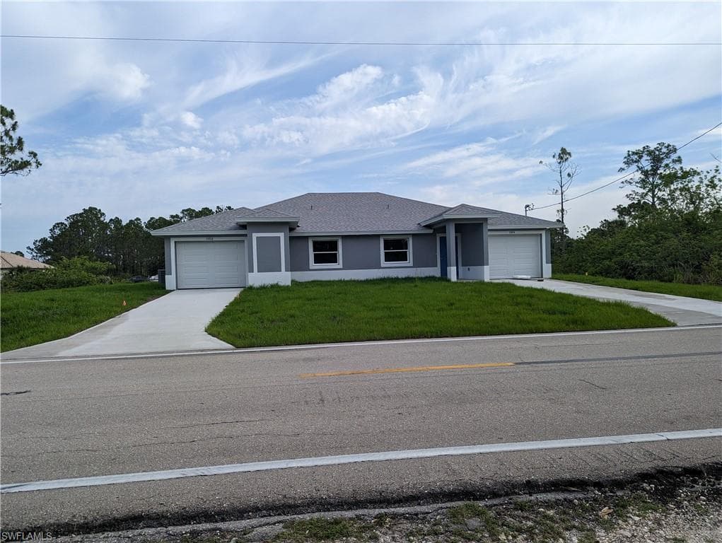 1304/1306 W 12th ST LEHIGH ACRES, FL 33972