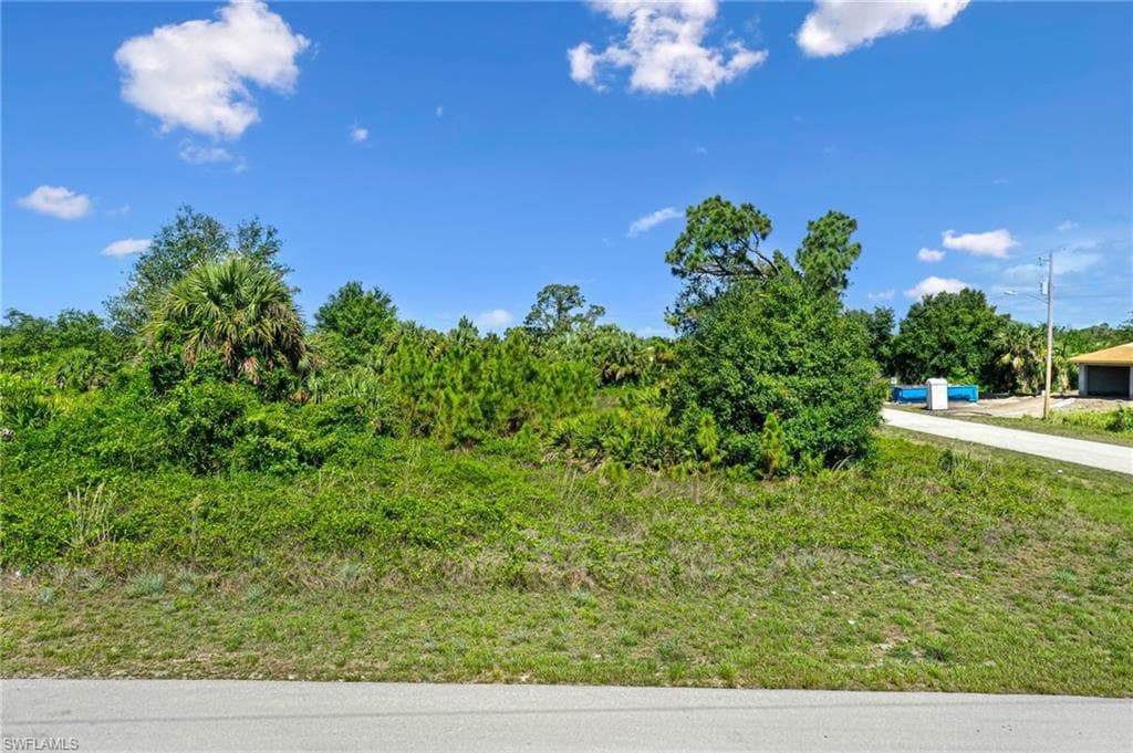 908 Mercury AVE S LEHIGH ACRES, FL 33974