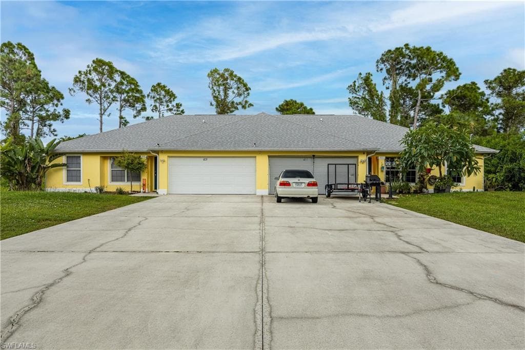 409-411 Chalet AVE S LEHIGH ACRES, FL 33974