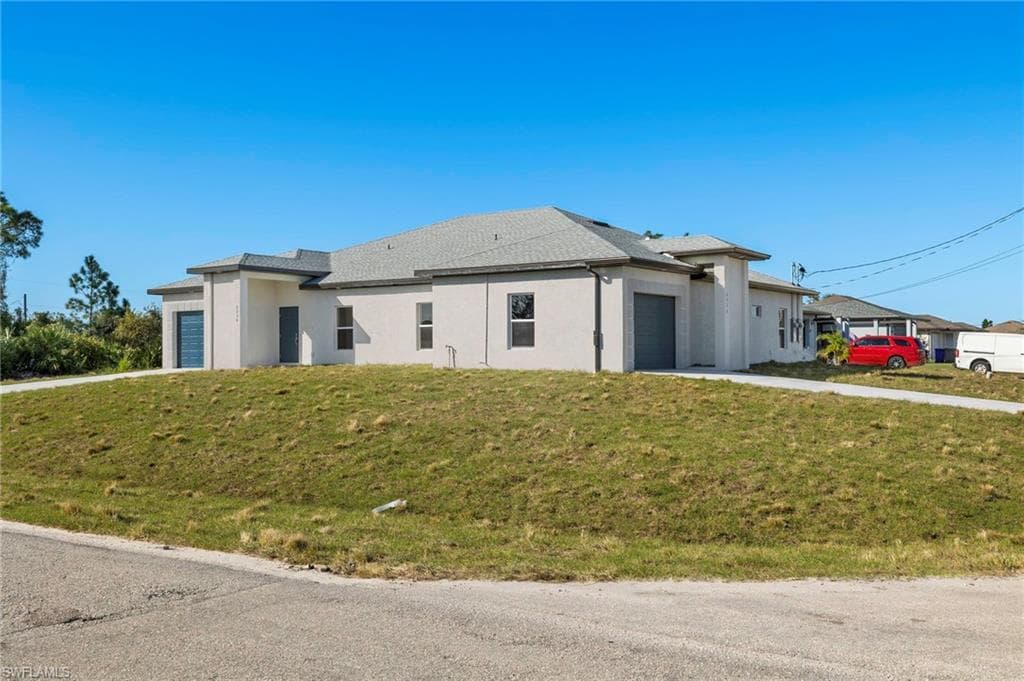 2201 KENNETH AVE S LEHIGH ACRES, FL 33973