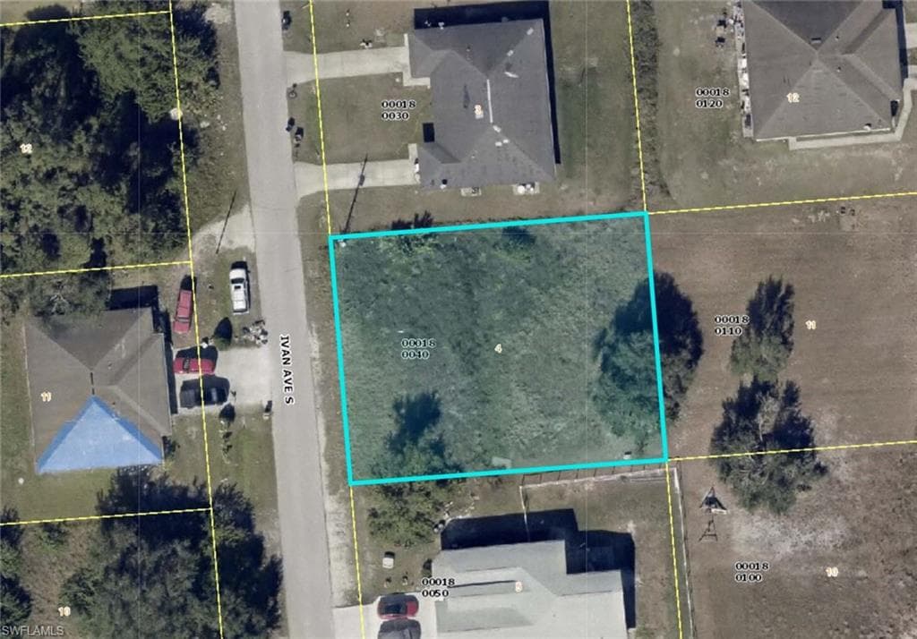 313/315 Ivan AVE S LEHIGH ACRES, FL 33973