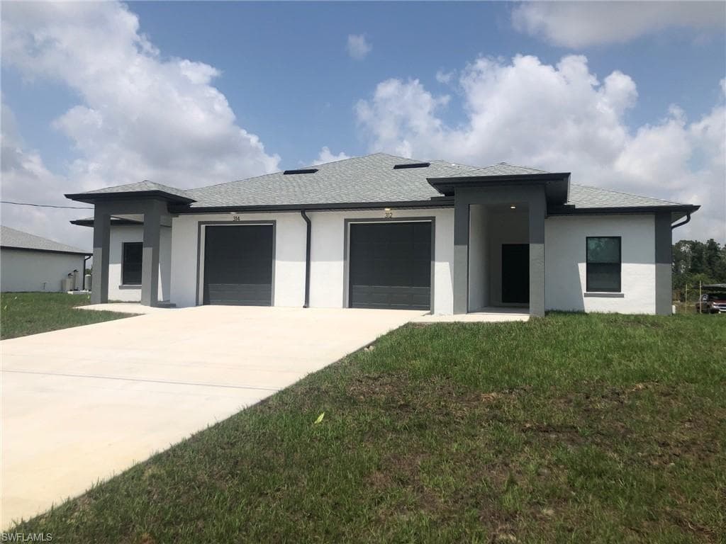 133-135 Hightower AVE S LEHIGH ACRES, FL 33973