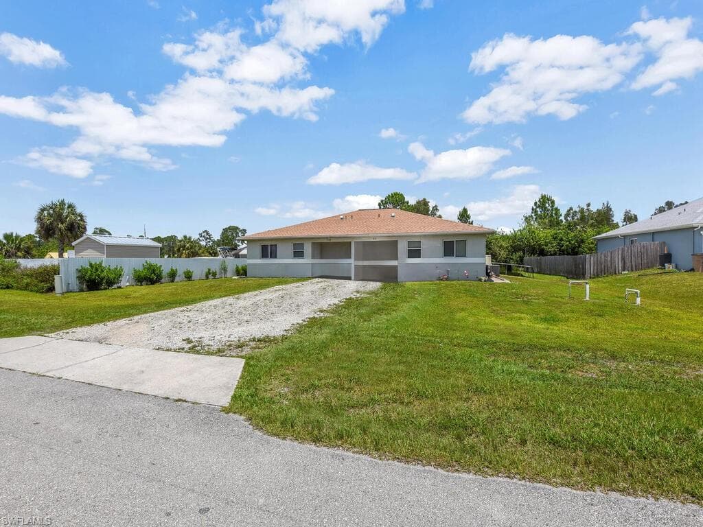 909-911 Jaguar BLVD LEHIGH ACRES, FL 33974