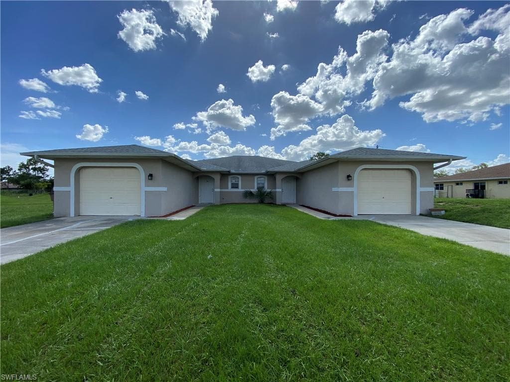 724 Jenna AVE S LEHIGH ACRES, FL 33973