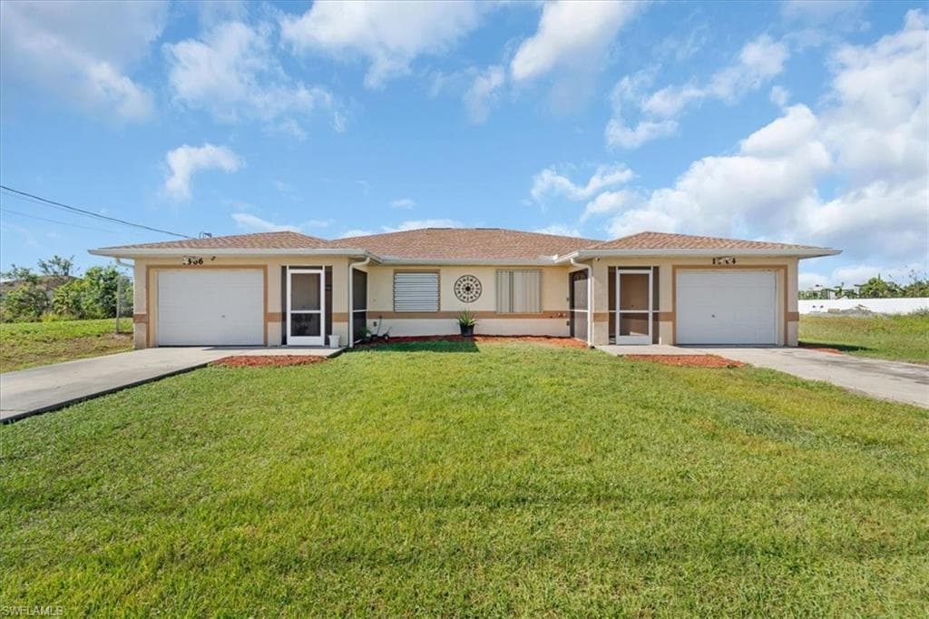 1564/1566 Gretchen AVE S LEHIGH ACRES, FL 33973