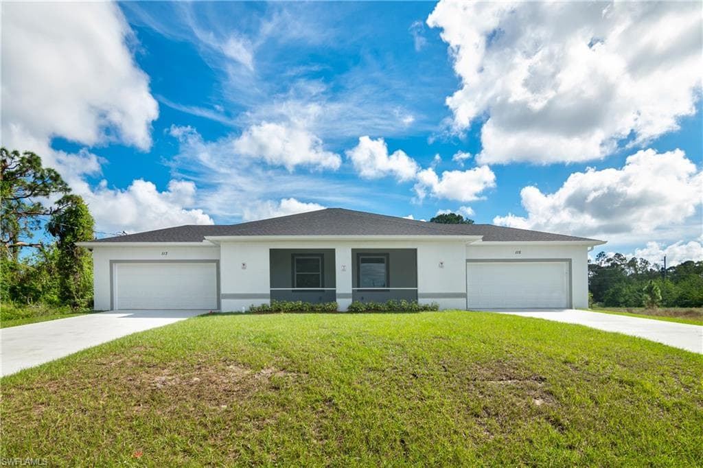 113-115 Gilbert AVE S LEHIGH ACRES, FL 33973