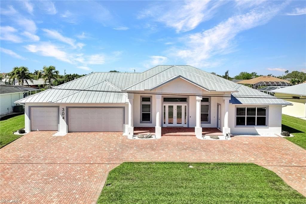 304 NE 14th AVE CAPE CORAL, FL 33909
