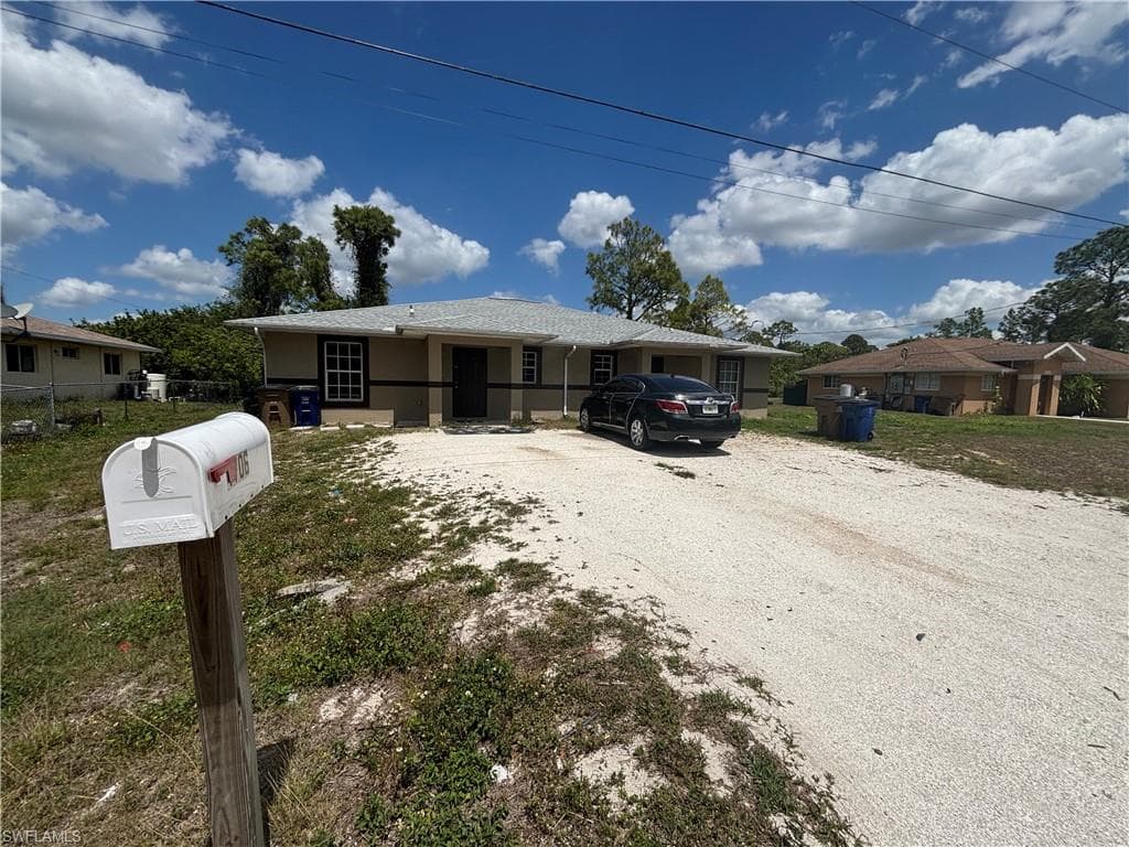 1704/1706 W 12th ST LEHIGH ACRES, FL 33972
