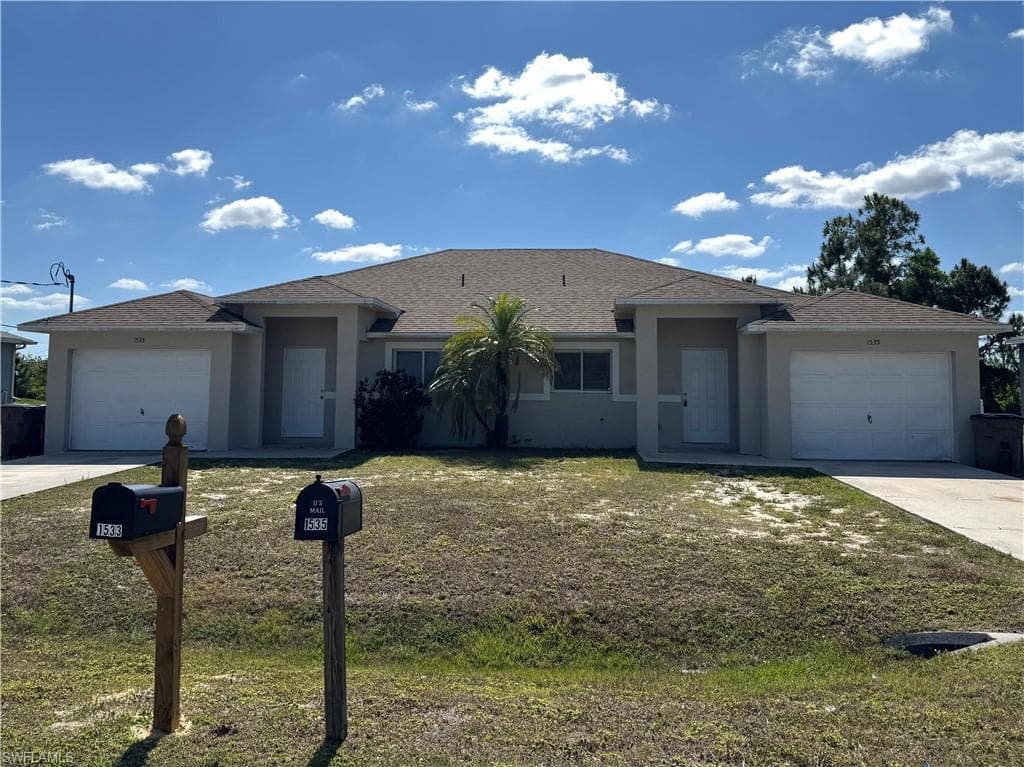 1533/1535 Hightower AVE S LEHIGH ACRES, FL 33973