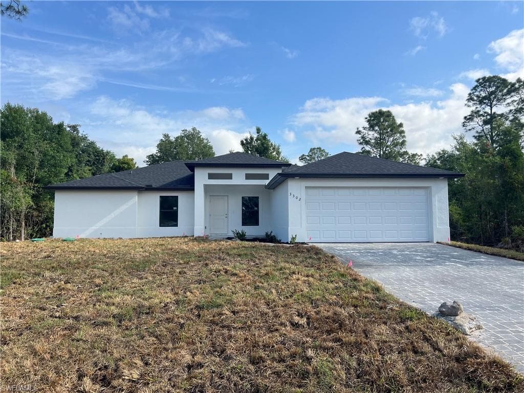 3302 20th ST W LEHIGH ACRES, FL 33971