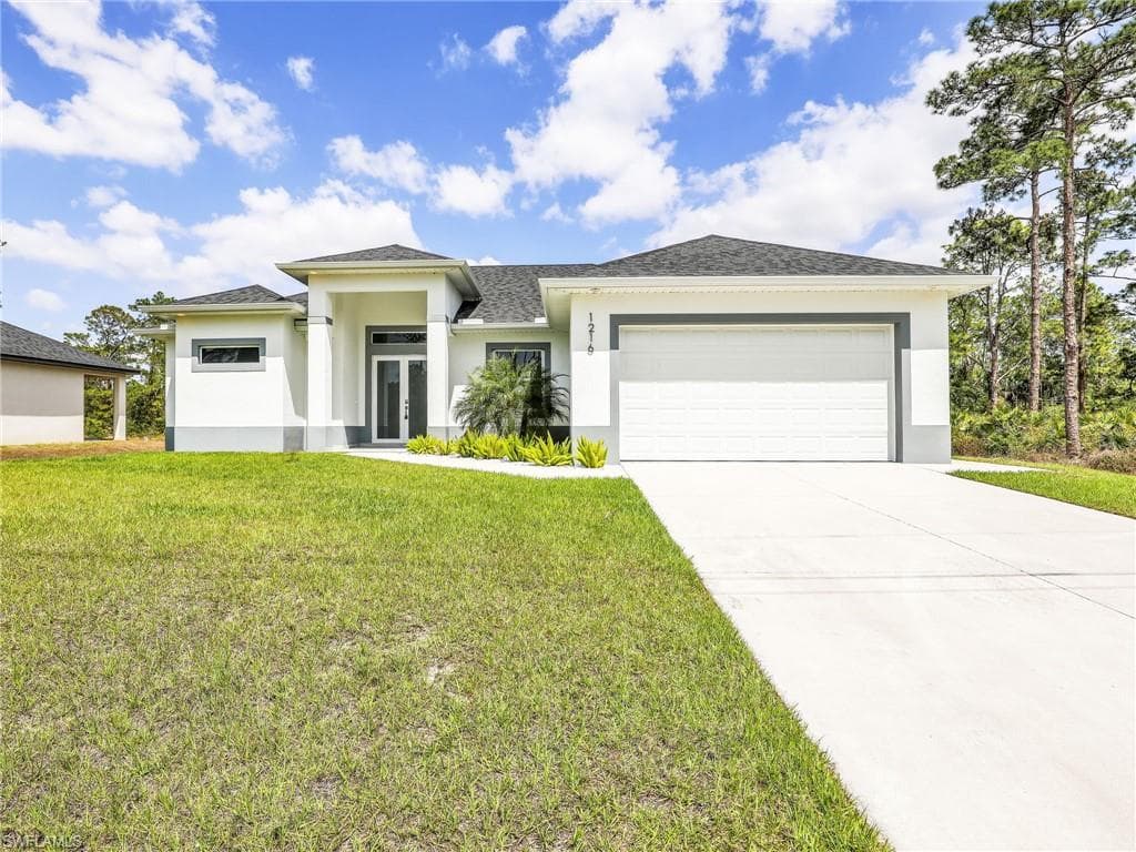1216 Moore AVE LEHIGH ACRES, FL 33972