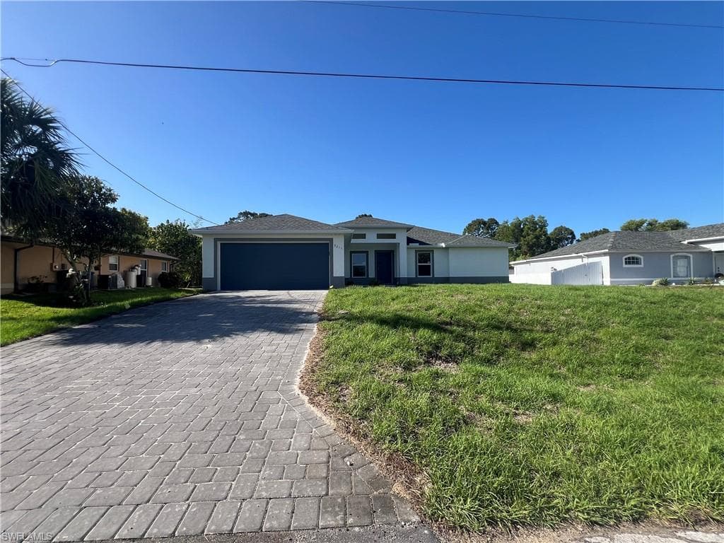 3211 25th ST SW LEHIGH ACRES, FL 33976