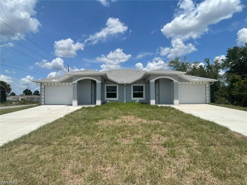 4713/4715 24th ST SW LEHIGH ACRES, FL 33973