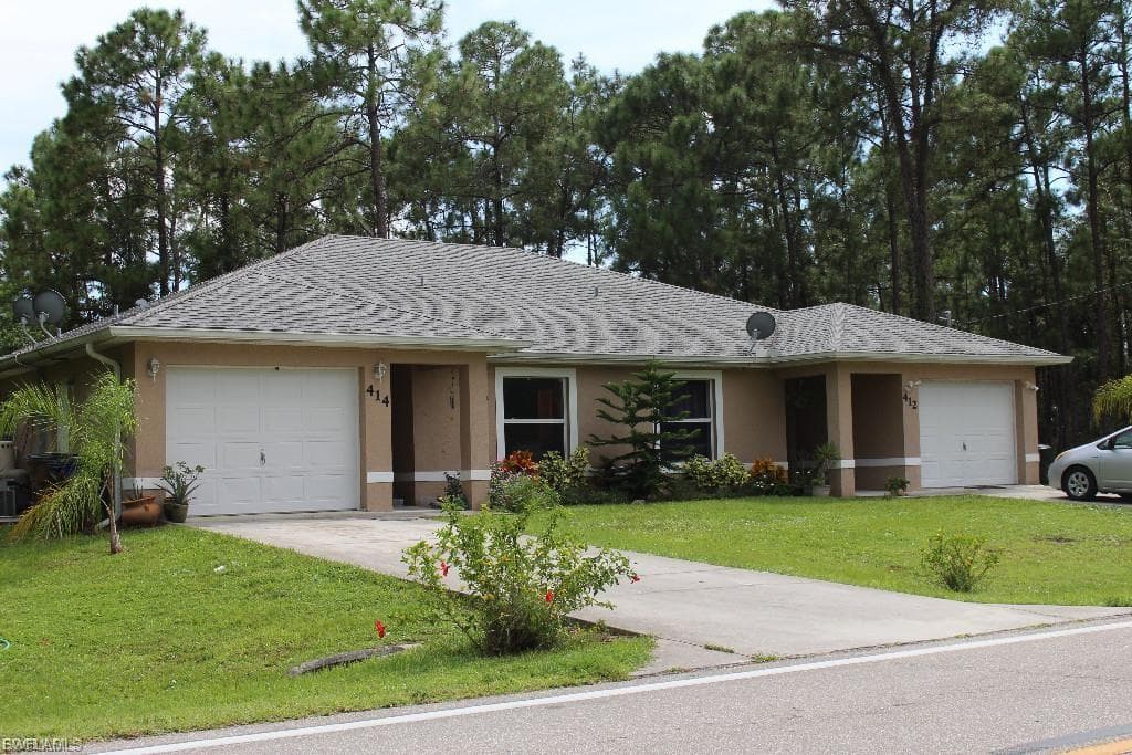 414 E 12th ST LEHIGH ACRES, FL 33972