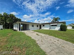 1109 E Jasmine RD LEHIGH ACRES, FL 33936