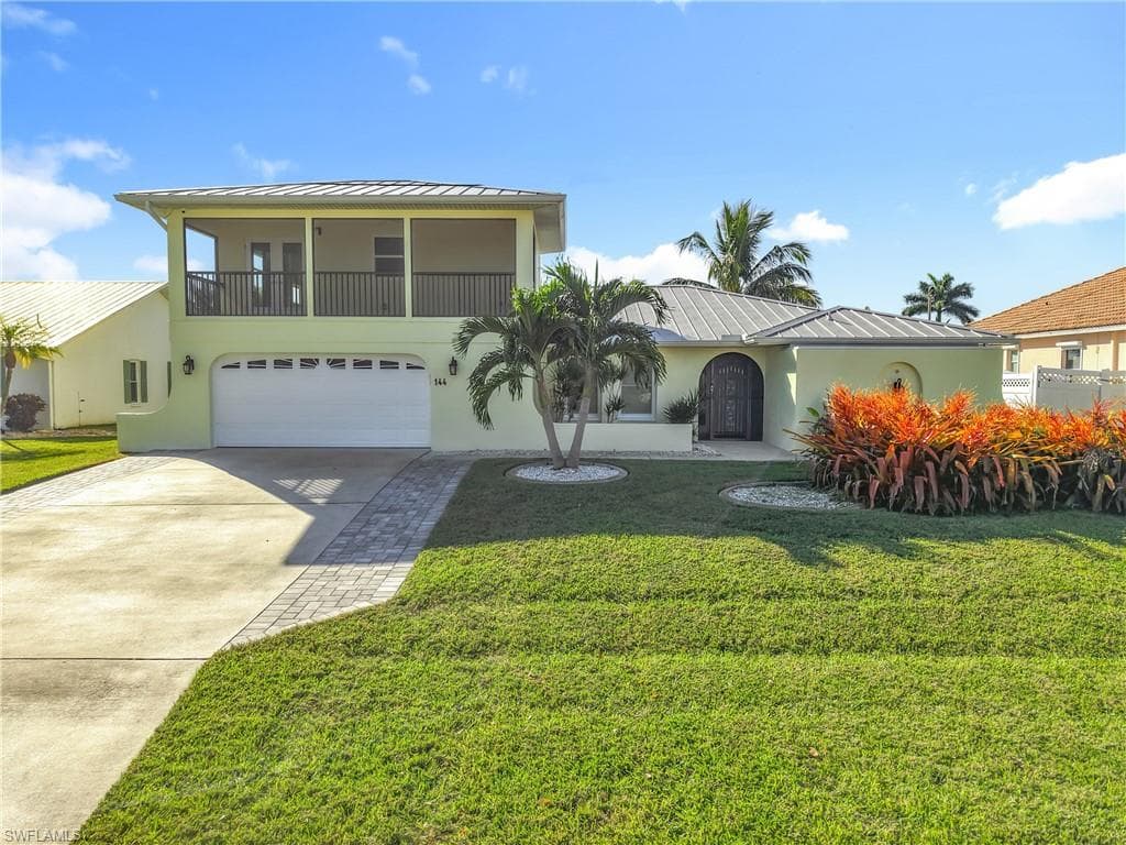 144 SW 38th TER CAPE CORAL, FL 33914