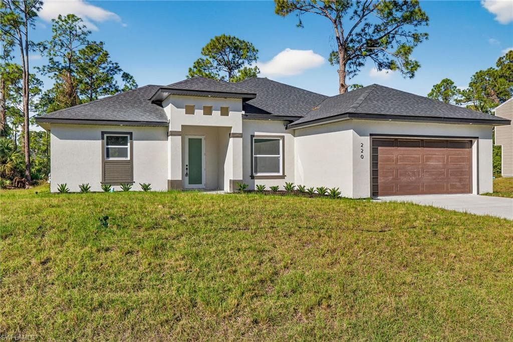 220 Lomax AVE S LEHIGH ACRES, FL 33974