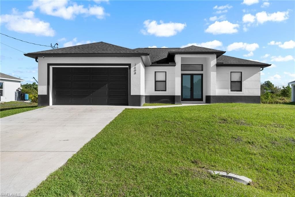 2608 25th ST W LEHIGH ACRES, FL 33971