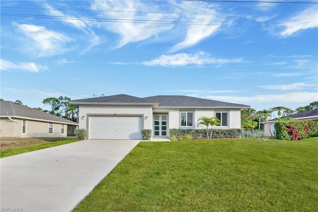 719 Little Rock ST E LEHIGH ACRES, FL 33974