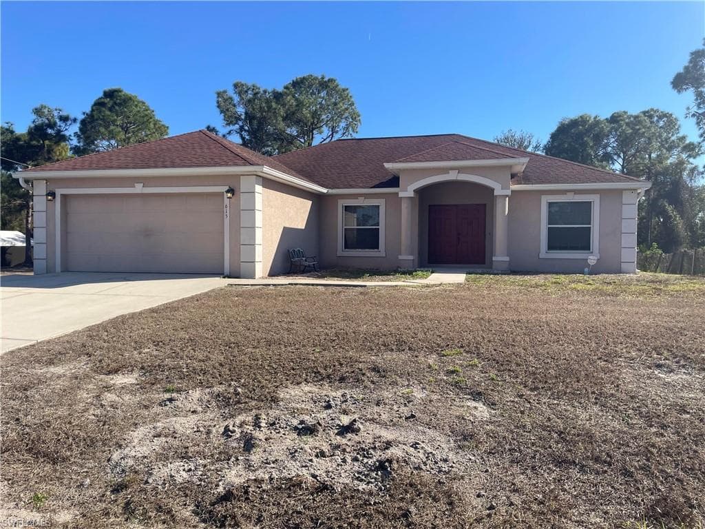 2615 19th ST W LEHIGH ACRES, FL 33971