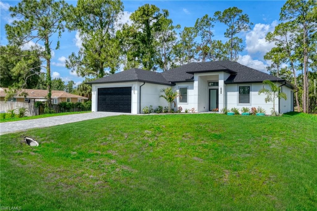 303 McArthur AVE LEHIGH ACRES, FL 33936
