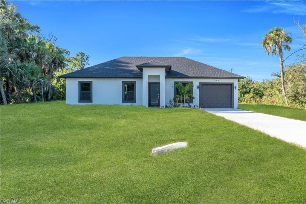 644 Woodcrest DR LEHIGH ACRES, FL 33972
