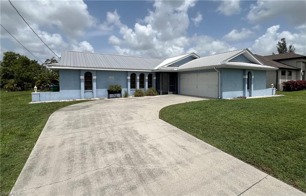 1402 SW 4th AVE CAPE CORAL, FL 33991