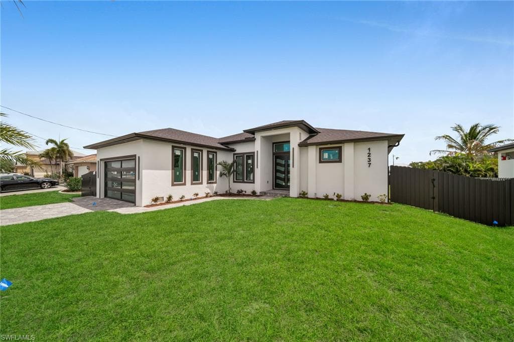 1237 NW 37th AVE CAPE CORAL, FL 33993