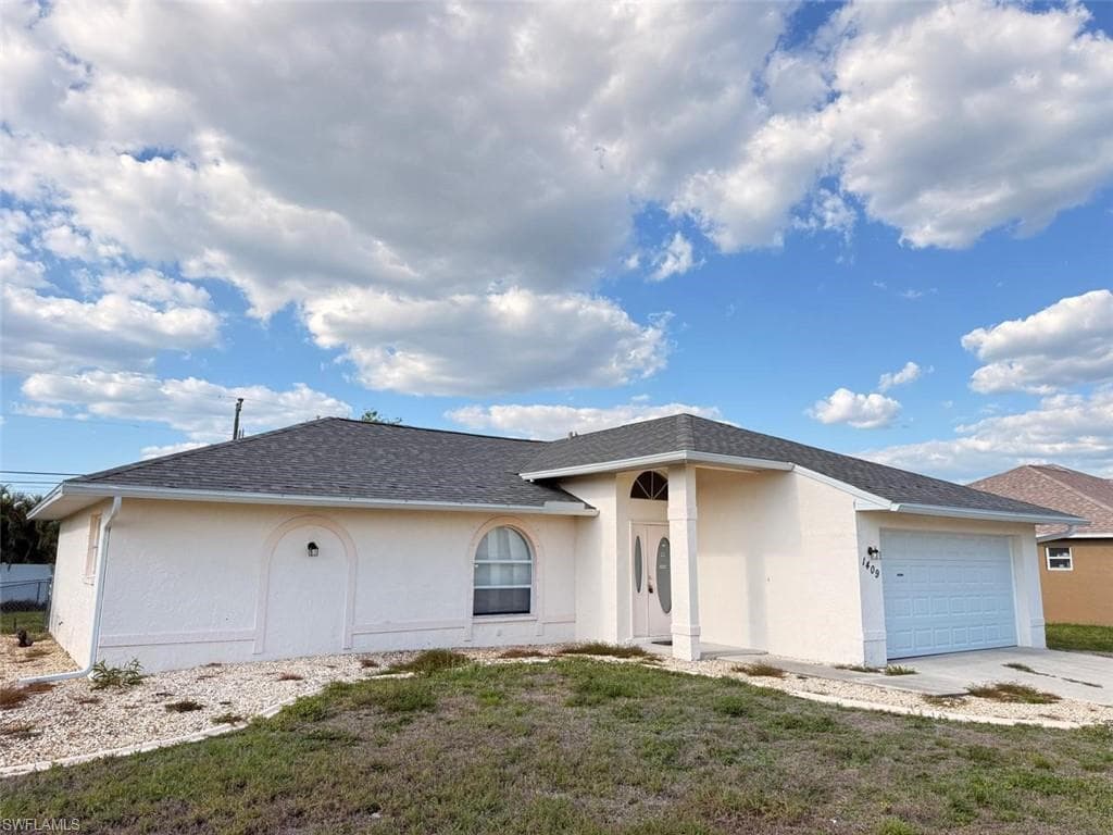 1409 SW 10th ST CAPE CORAL, FL 33991