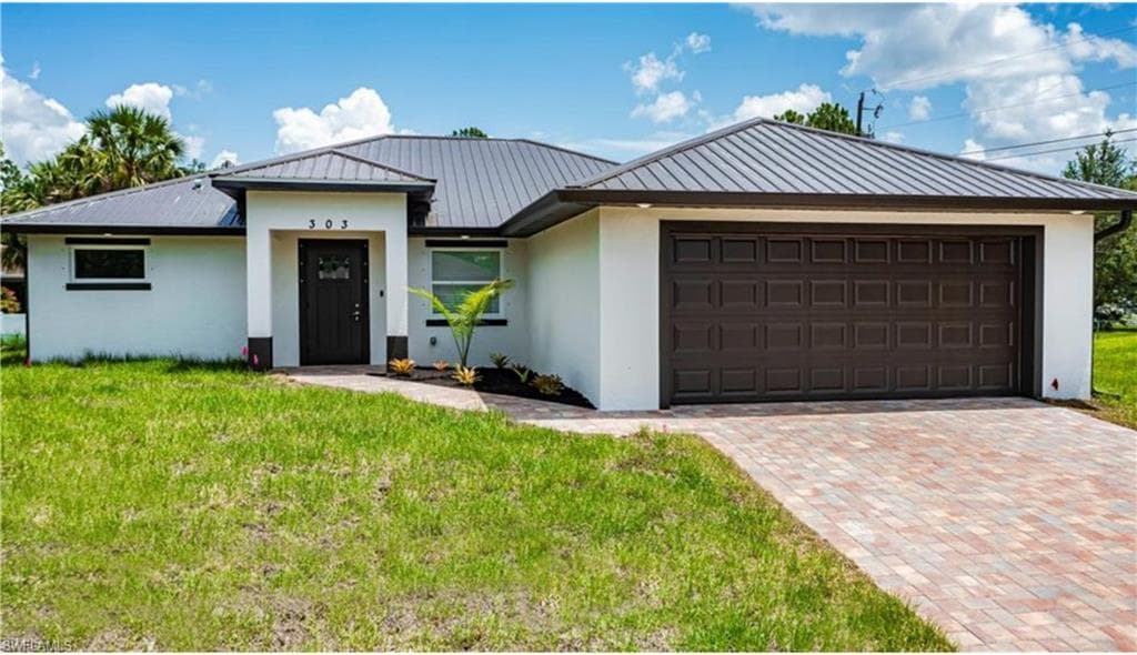 303 E 7th ST LEHIGH ACRES, FL 33972