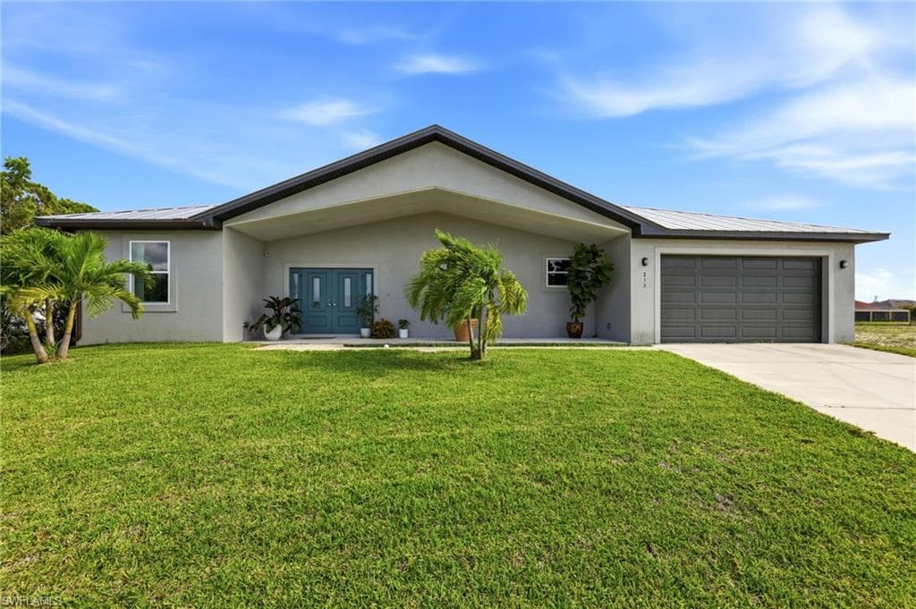 212 SW 20th ST CAPE CORAL, FL 33991
