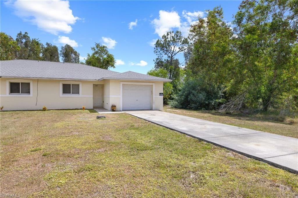 221 Meadow RD LEHIGH ACRES, FL 33973