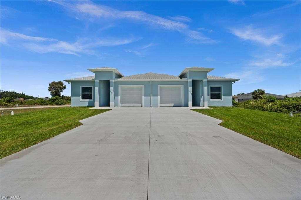 301/303 PENNFIELD ST LEHIGH ACRES, FL 33974