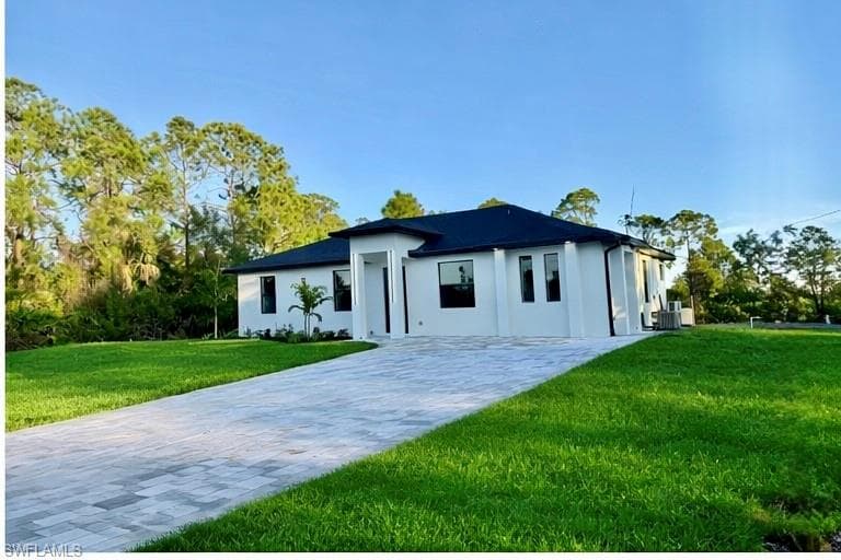 642 Sunflower AVE S LEHIGH ACRES, FL 33974