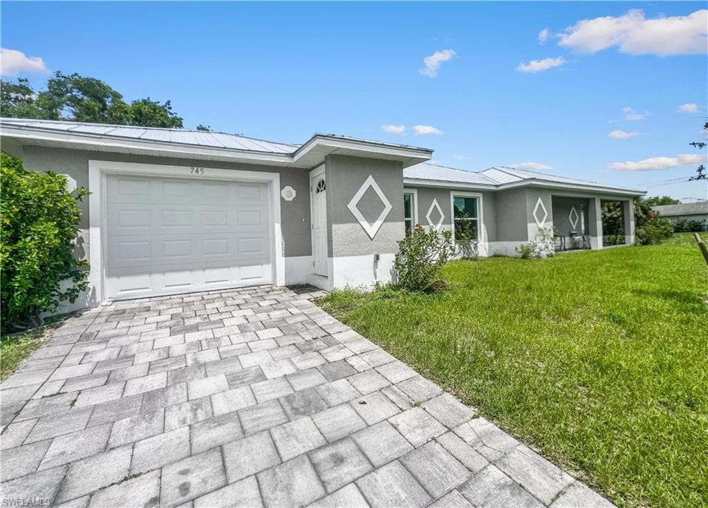 745 Harry AVE S LEHIGH ACRES, FL 33973