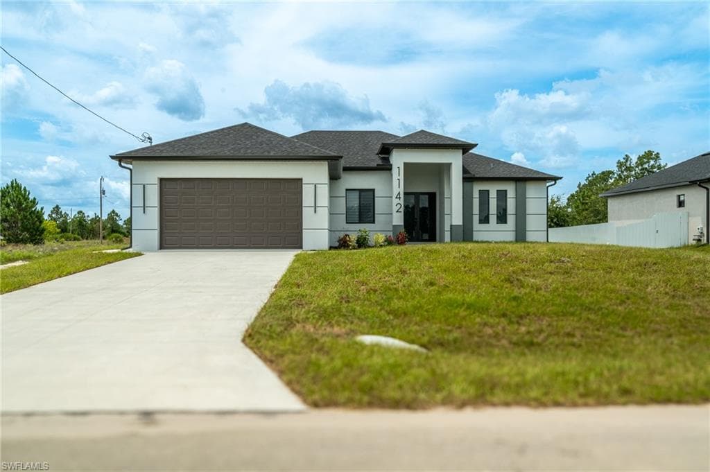 1142 ECLIPSE ST E LEHIGH ACRES, FL 33974