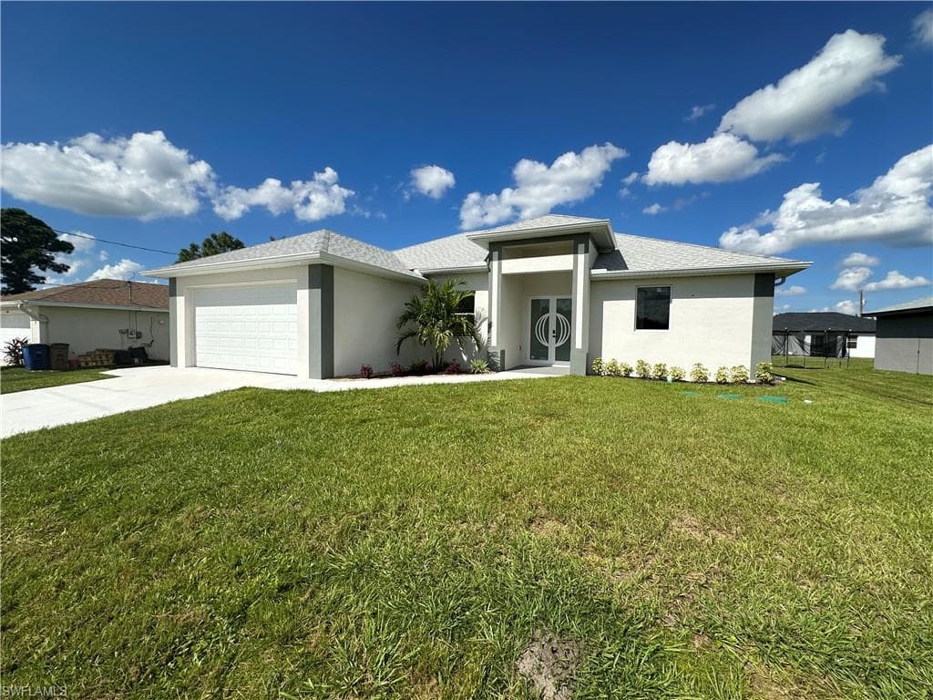 3208 7th ST W LEHIGH ACRES, FL 33971