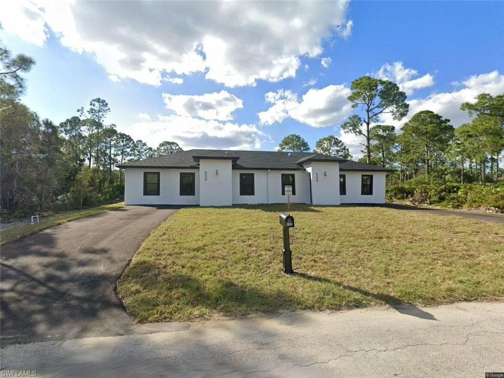 930 Hepburn AVE LEHIGH ACRES, FL 33974