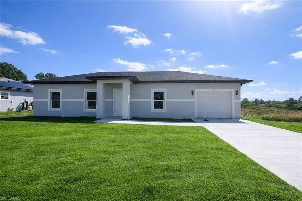 506 Alexia AVE S LEHIGH ACRES, FL 33974