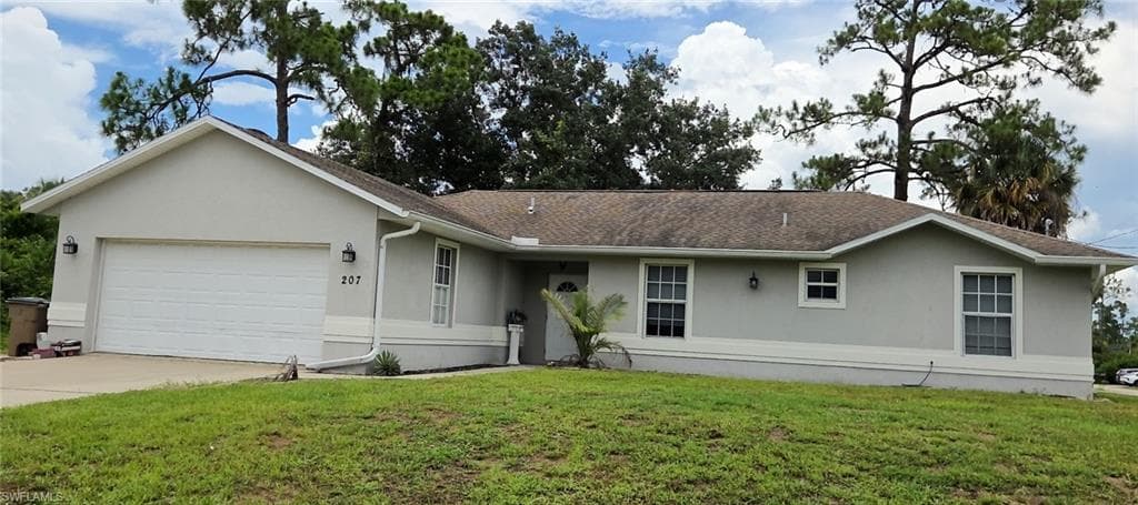 207 E 8th ST LEHIGH ACRES, FL 33974