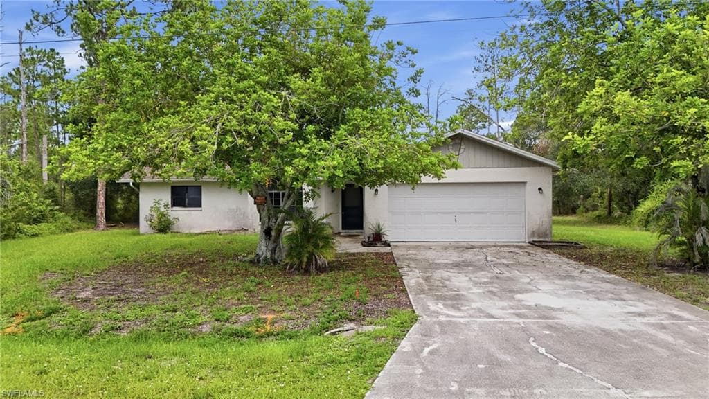 906 Wells AVE LEHIGH ACRES, FL 33972
