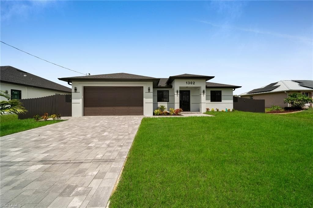 1302 NE Juanita PL CAPE CORAL, FL 33909