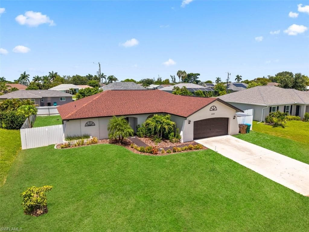 2214 SW 13th AVE CAPE CORAL, FL 33991
